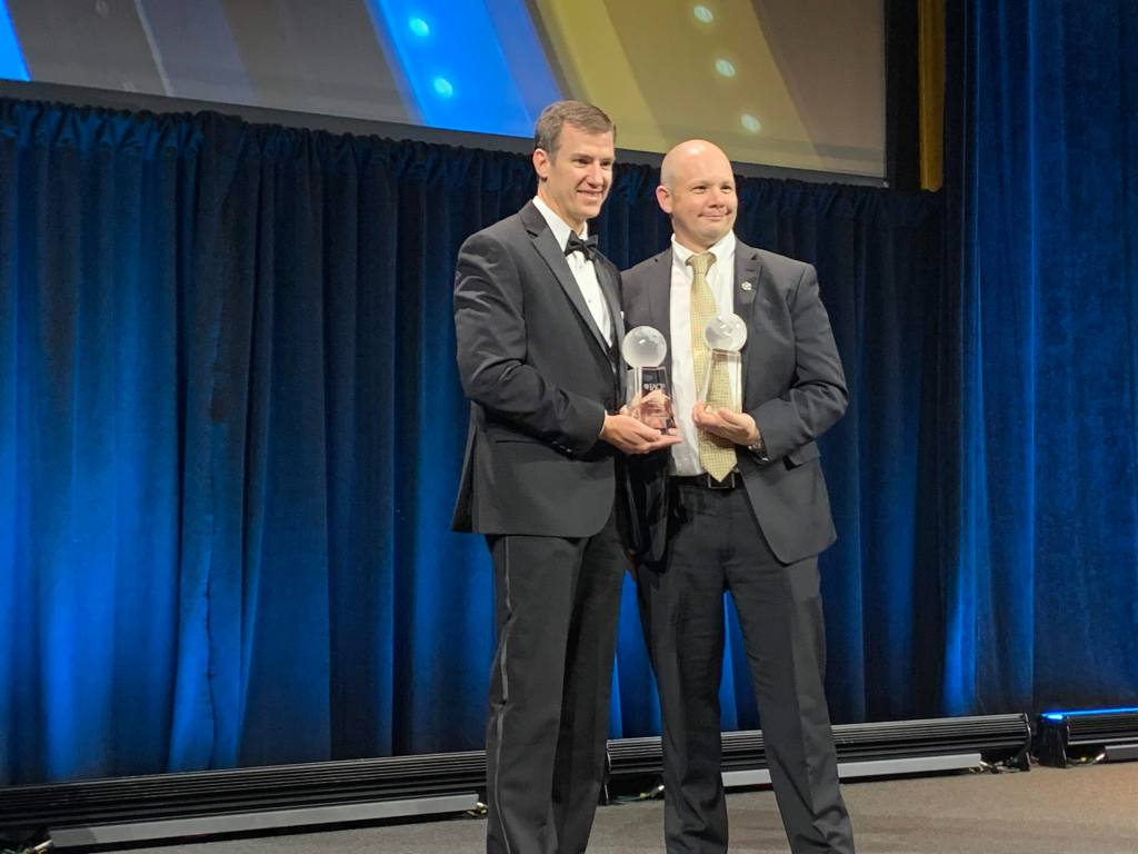 Posing with their awards are Chief Will Johnson of the Arlington Police Department in Texas and Police Chief Ronald Sellon from the Mansfield Police Department in Massachusetts.